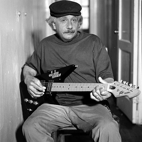 Einstein playing guitar